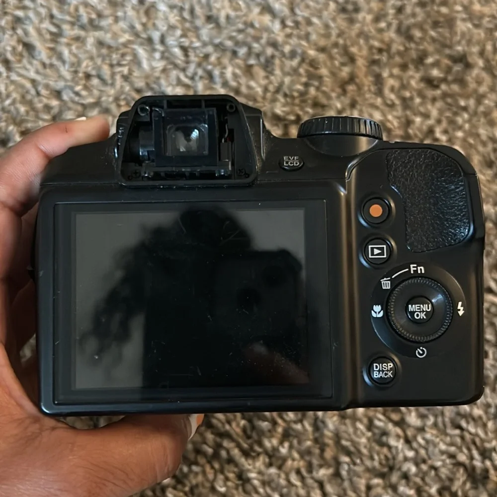 CAMERA Brand:Fuji-film color: Black and it’s digital.